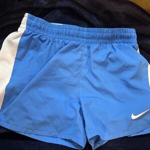 Nike Girl’s Size L Light Blue Athletic Shorts with White Swoosh